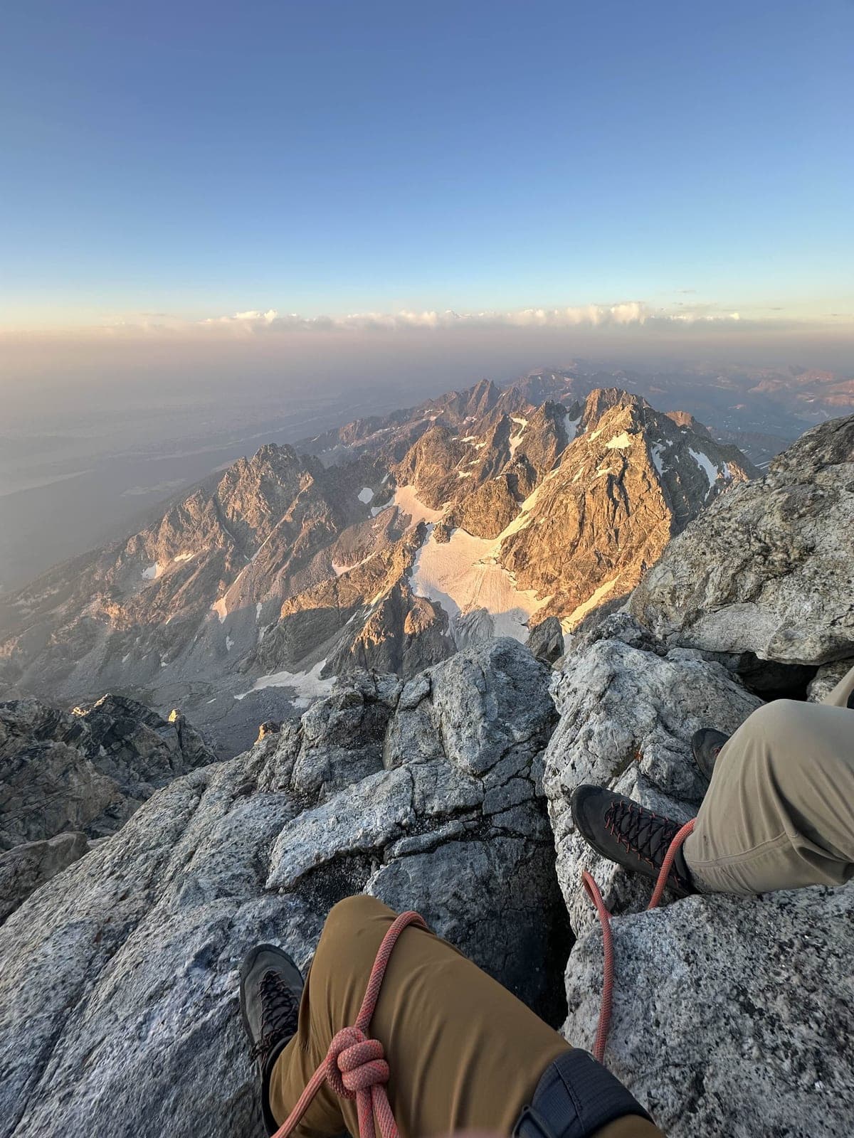 Sunrise over a neighboring peak in the Teton range